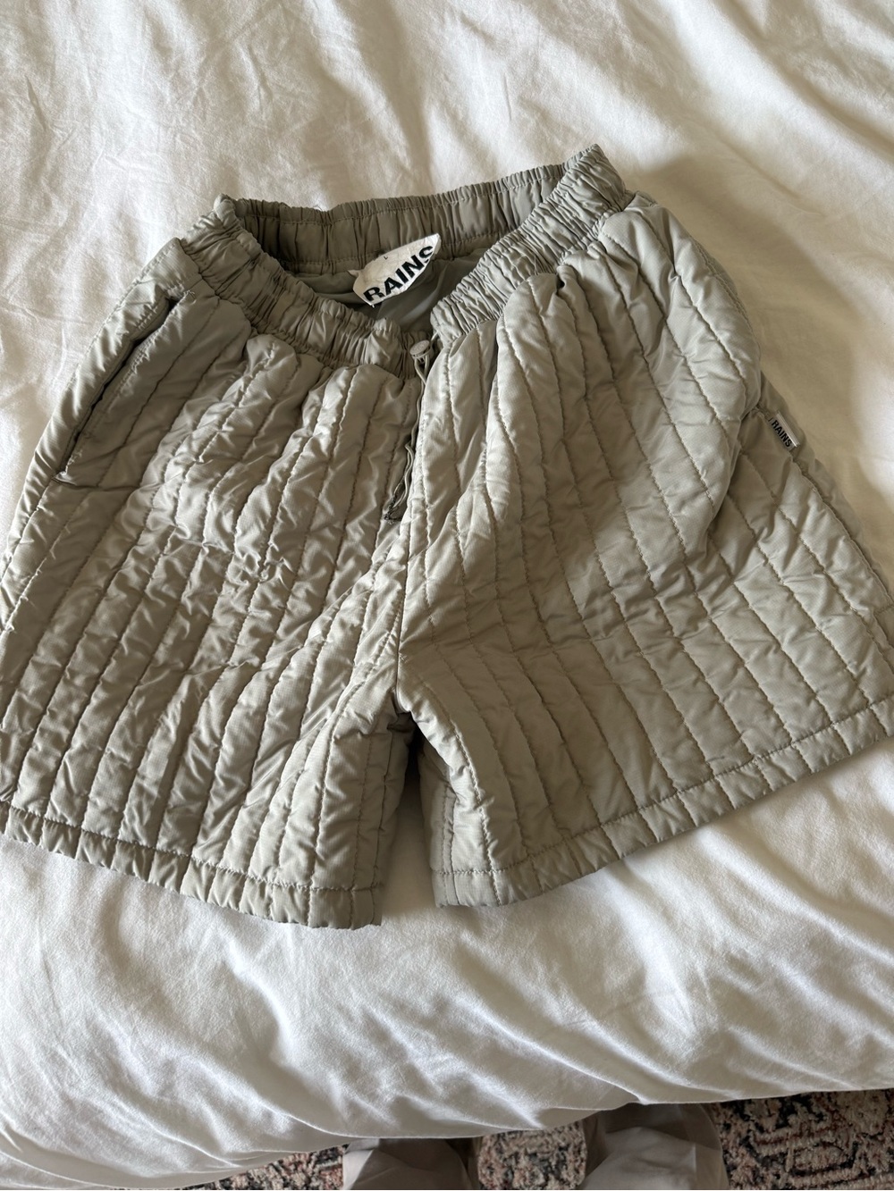 Rains Quilted Drawstring Shorts in Olive